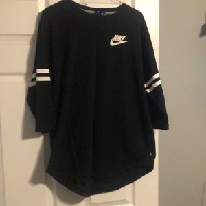 Long sleeve Nike shirt. Back of shirt “Just Do It”